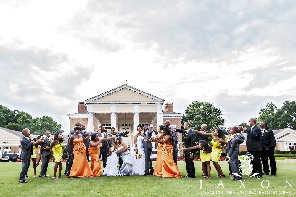 Wedding party on the lawn infront of the Eagles Landing Club House