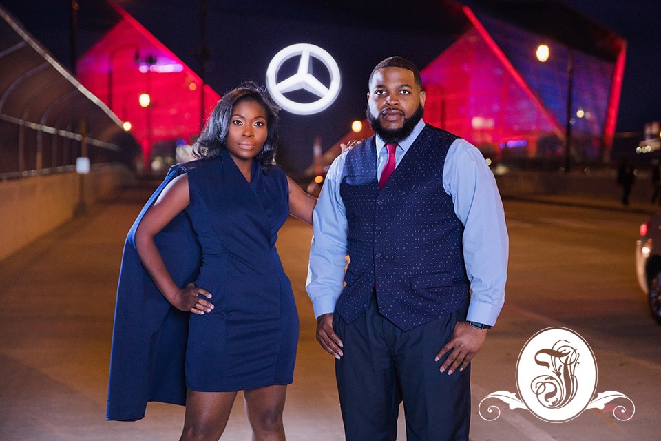 Mercedes Benz Stadium at night, a fitting backdrop for these Falcons Fans